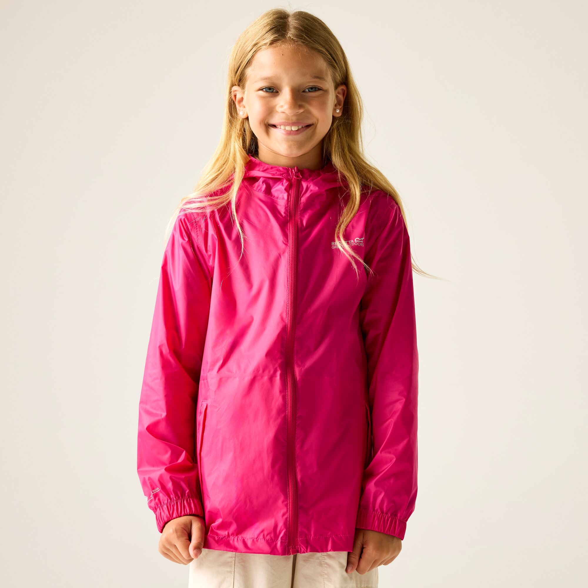 Regatta Regatta Kurtka przeciwdeszczowa dziecięca wiosenna kieszonkowa Pack It III Różowy