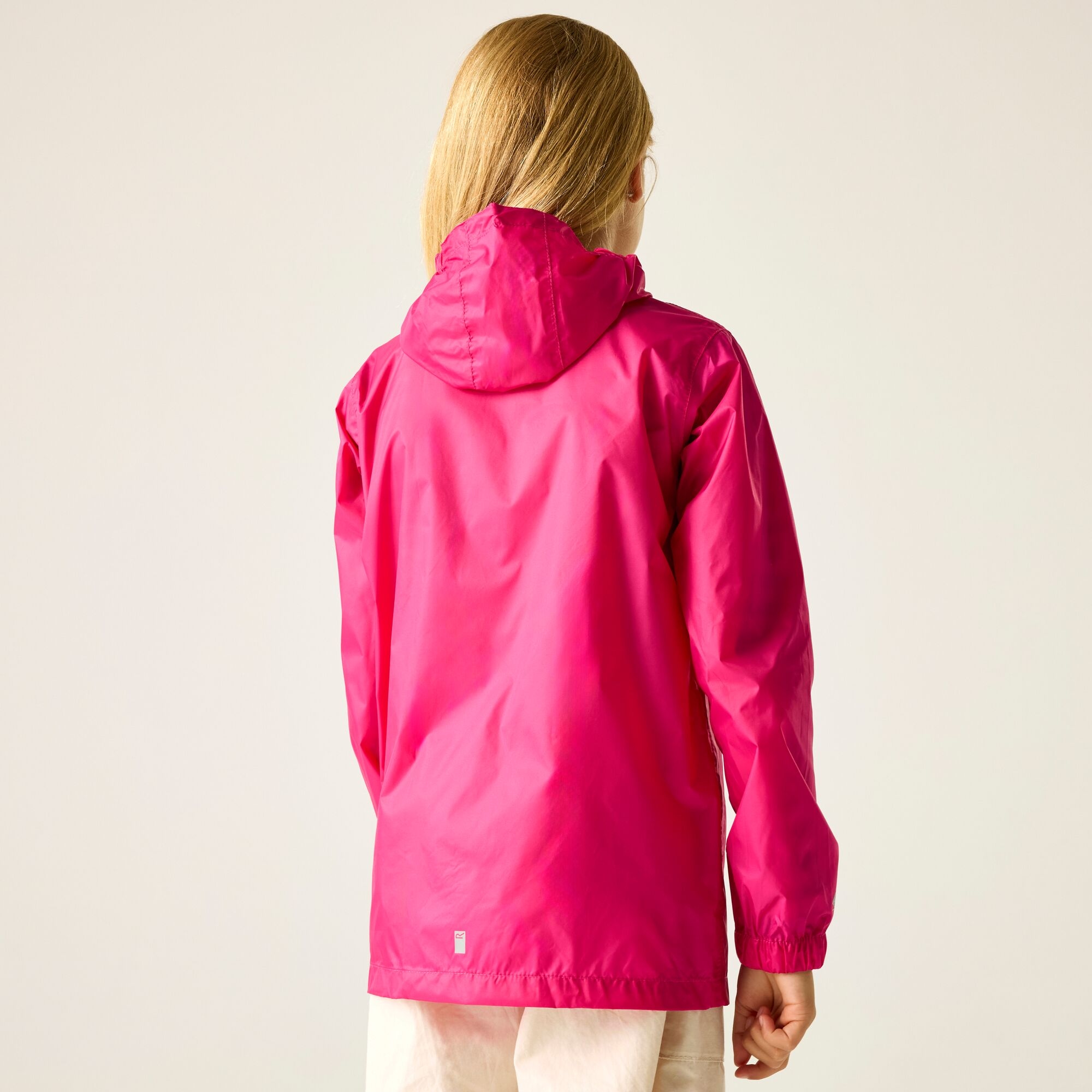 Regatta Regatta Kurtka przeciwdeszczowa dziecięca wiosenna kieszonkowa Pack It III Różowy